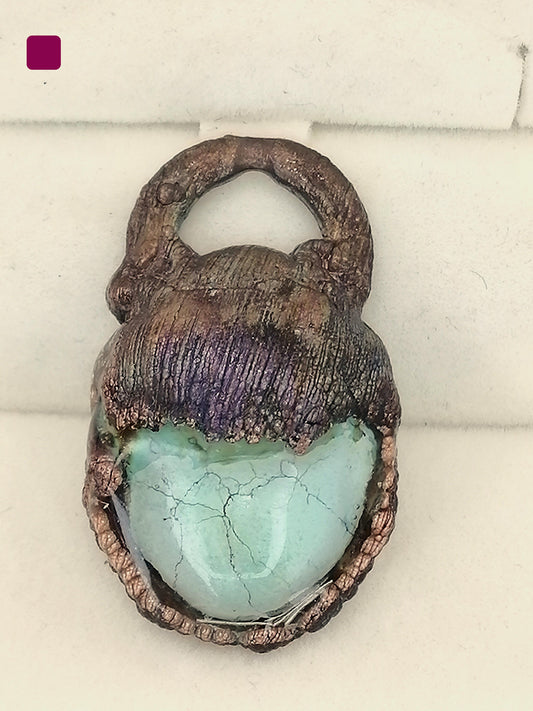 electroformed copper pendant with enclosed malachite and artificial patina