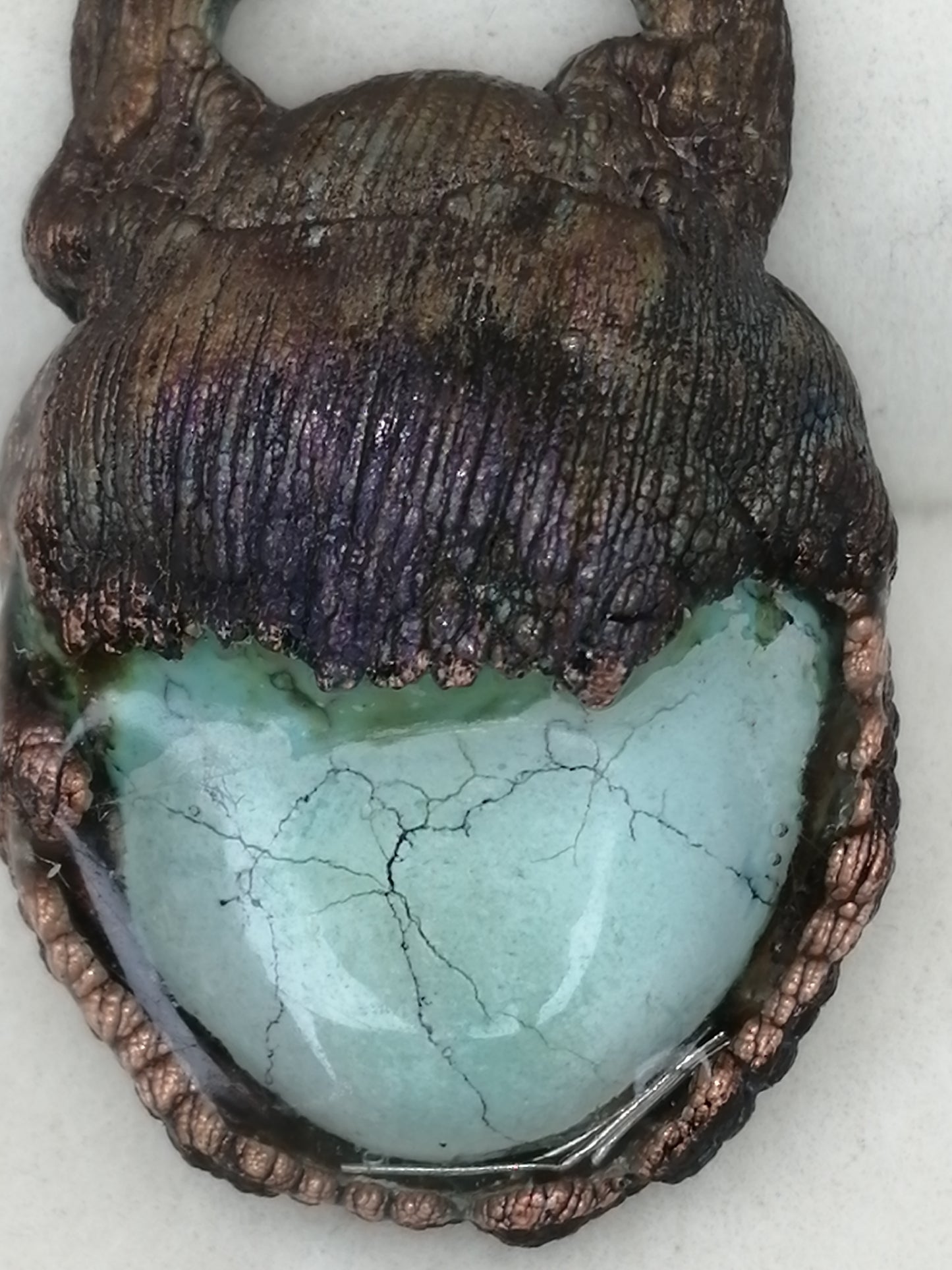 electroformed copper pendant with enclosed malachite and artificial patina