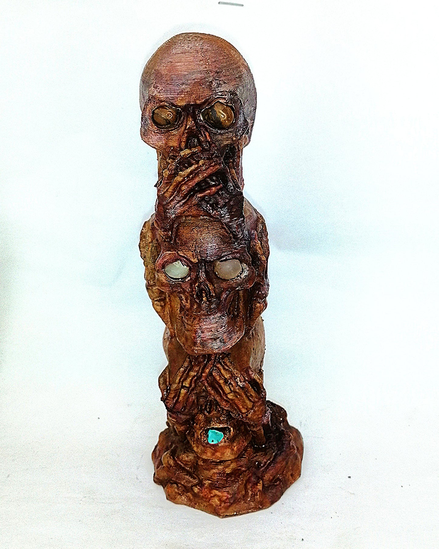 See/speak/hear no evil-3 skulls, enclosed semi-precious gems and artificial patina