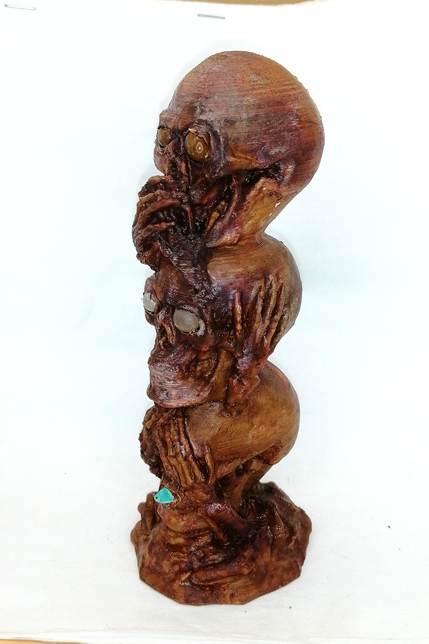 See/speak/hear no evil-3 skulls, enclosed semi-precious gems and artificial patina